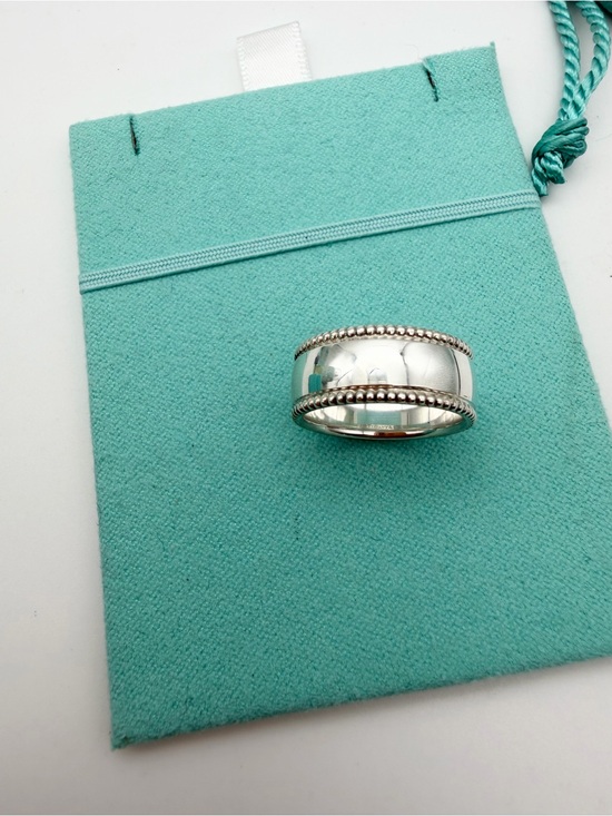 Tiffany & Co. size 6.5 “Tiffany & Co.” Script Notes Band Ring Silver